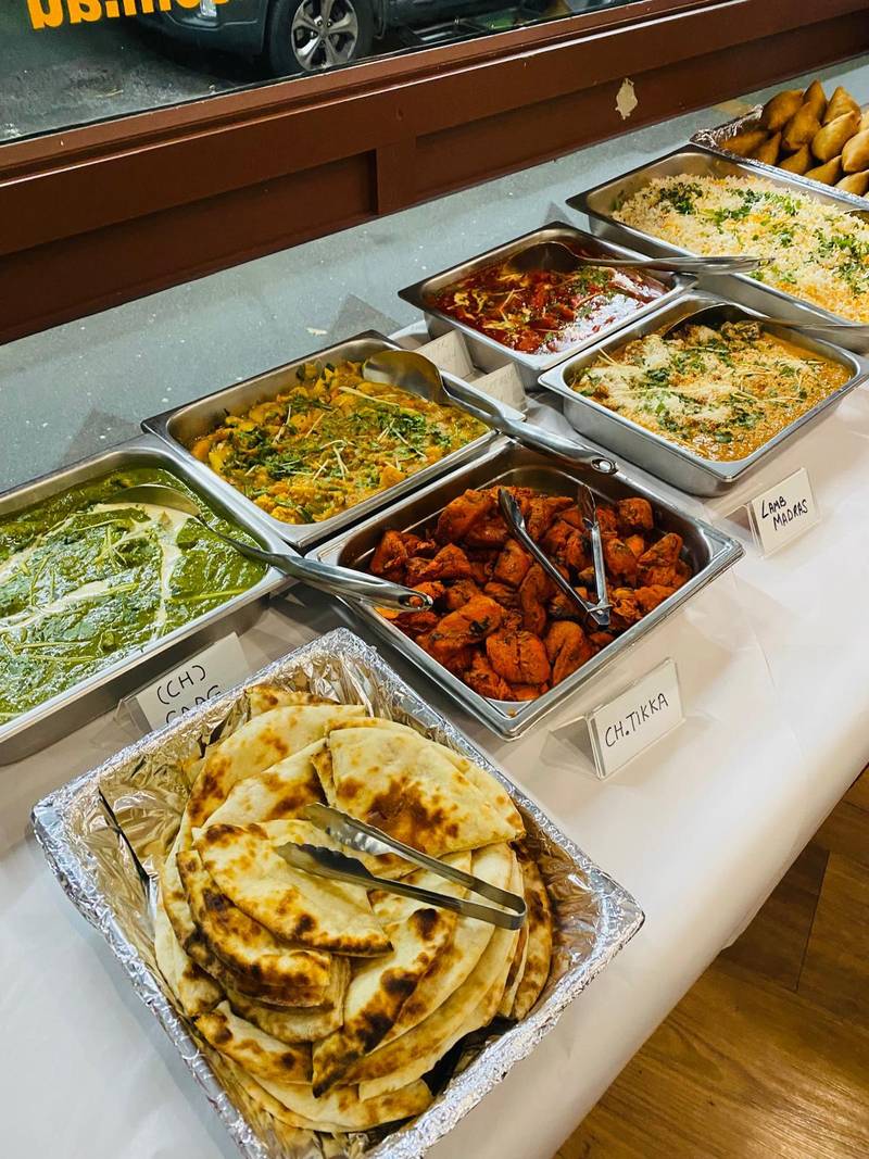Function buffet — curries, chicken tikka, rice & naan